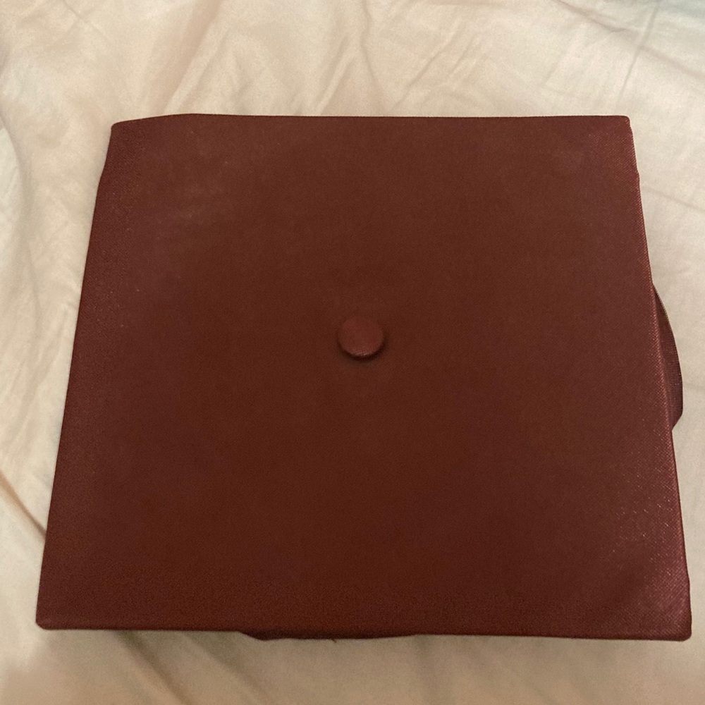 Maroon graduation cap